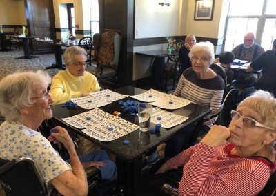 four women playing bingo