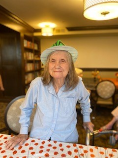 portrait of elderly woman in a witch hat
