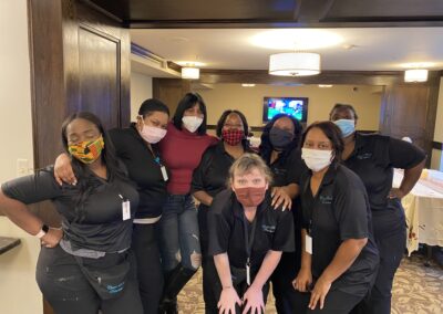 chester street staff members pose in masks