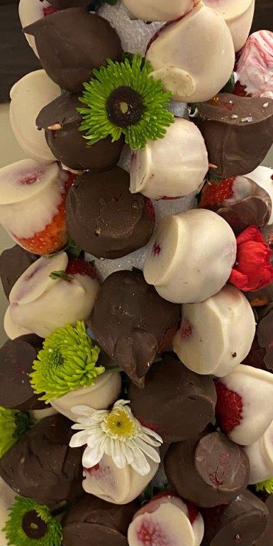 chocolate covered strawberry tower with flowers